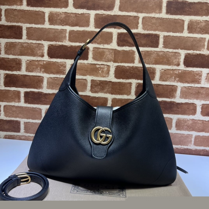 G*u*i top handle bags